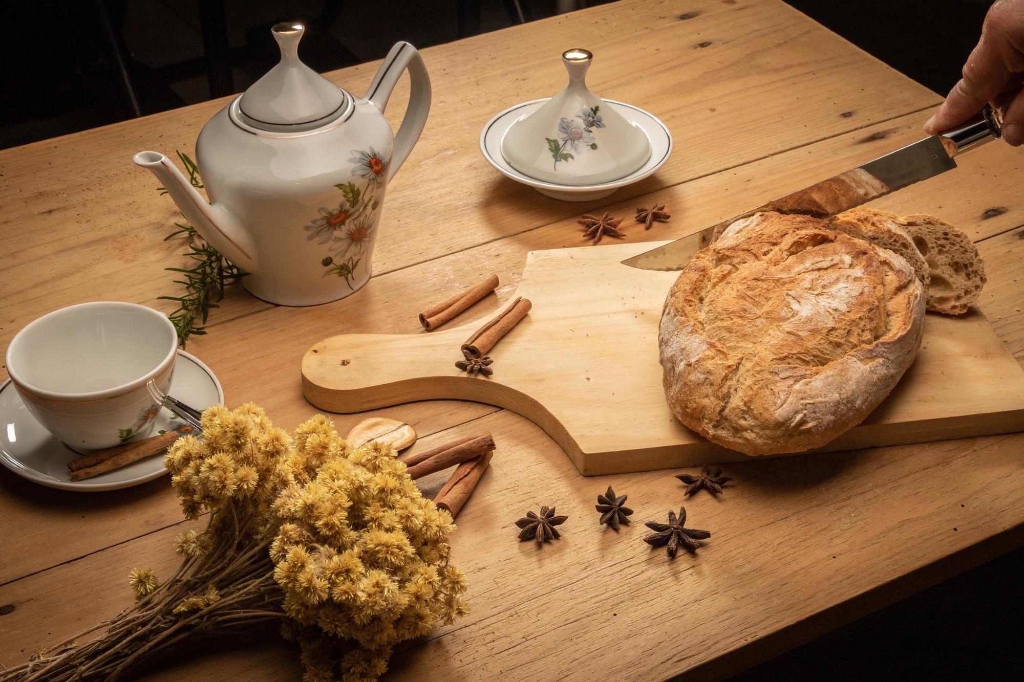 Warm kitchen bench with herbs and utensils